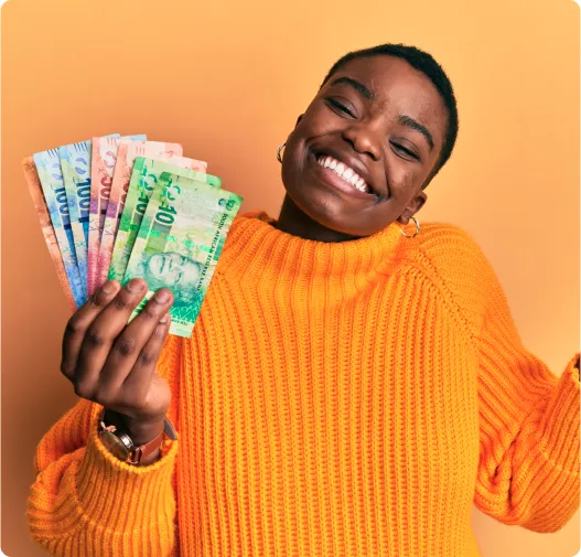 Smiling black woman holding her travel currency Smiling black woman holding her travel currency