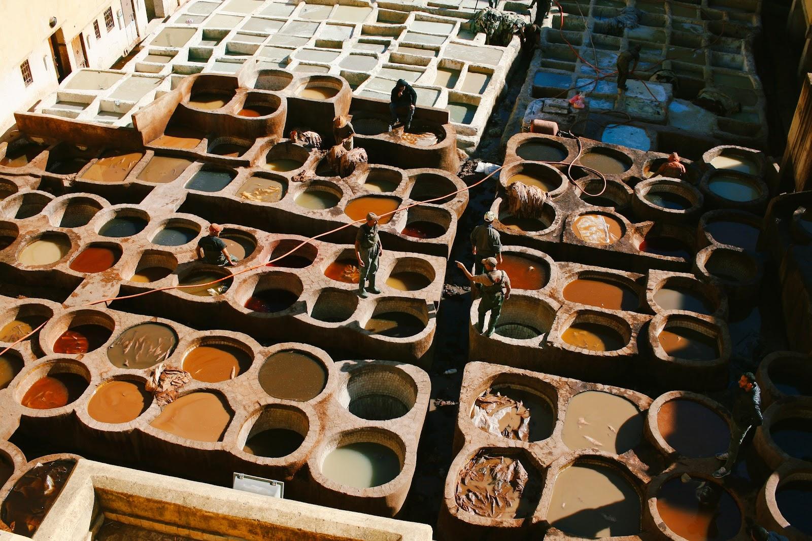 Workers dyeing leather in The Chouara Tannery.