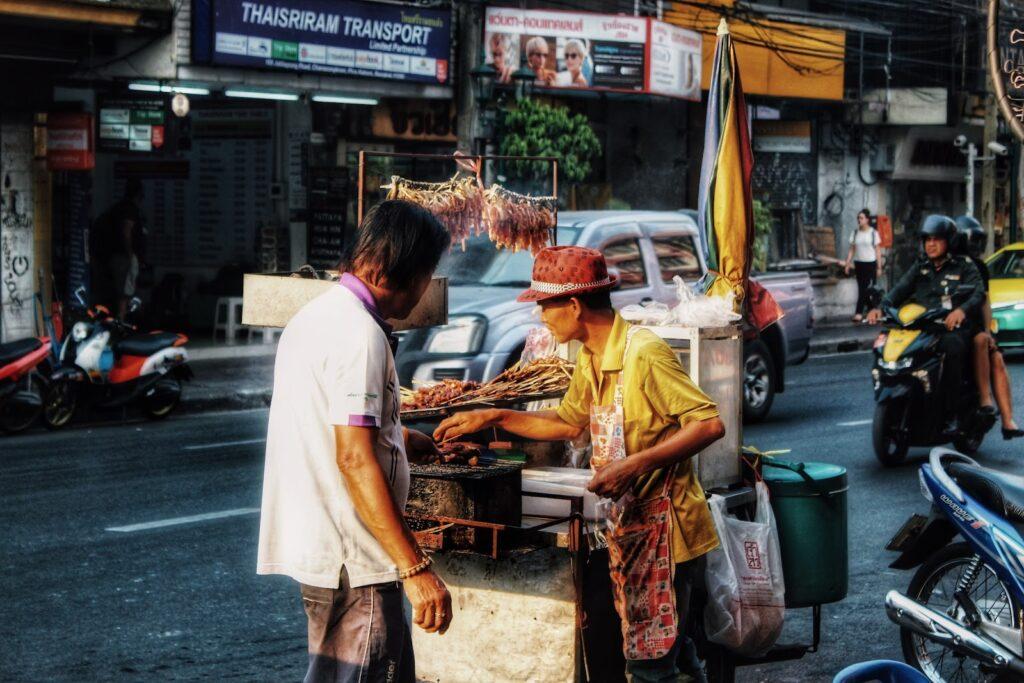 Street vendor selling dried squid to the locals of Cambodia.