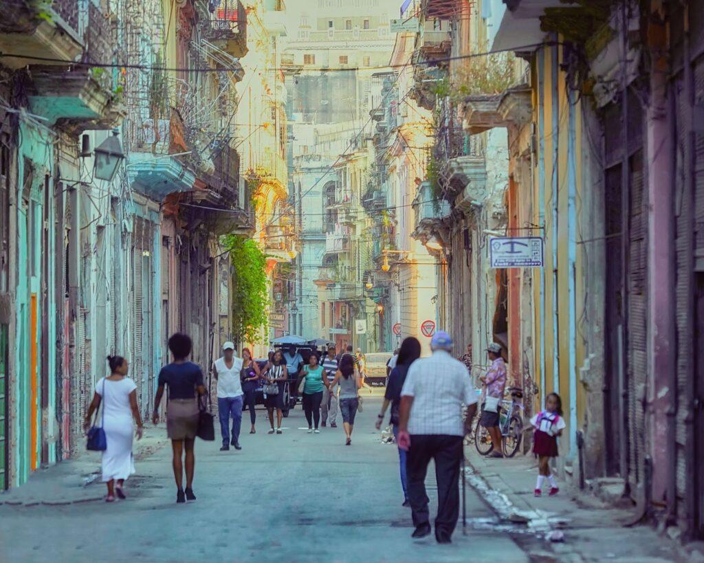 People walking through the streets of Havana