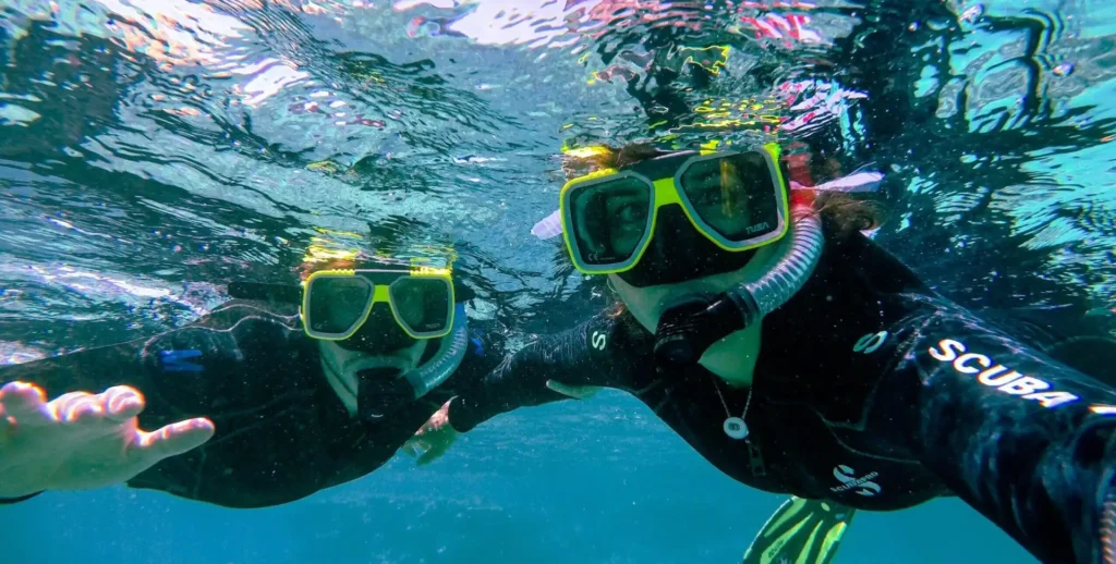Couple snorkelling in the Seychelles