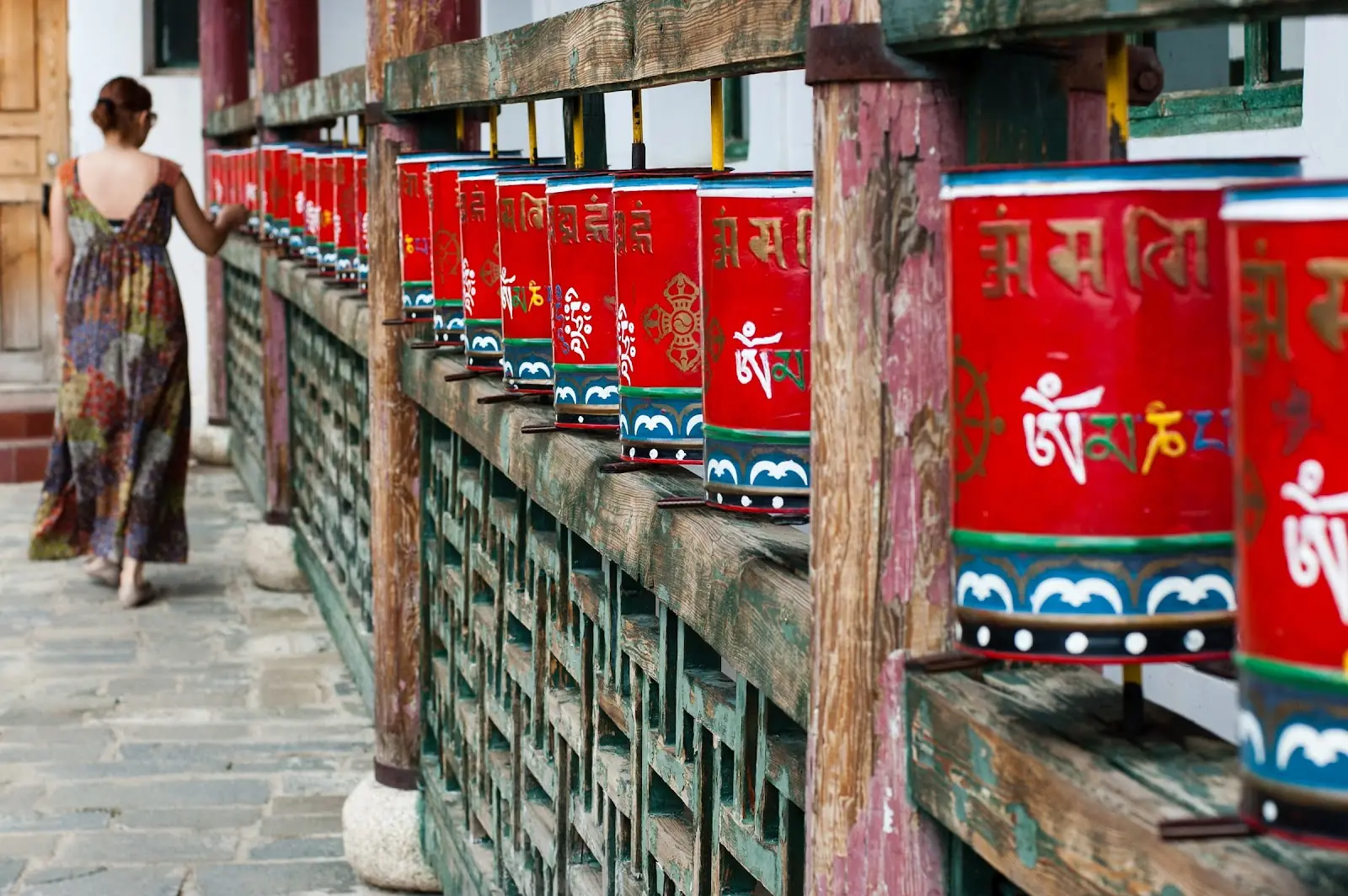A row of Mongolian buddhist prayer wheels.