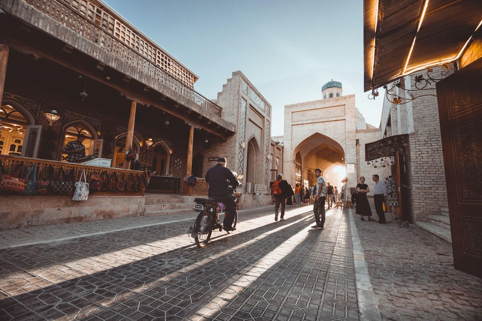 a man cycling in the Toki-Sarrofon Trading Dome.