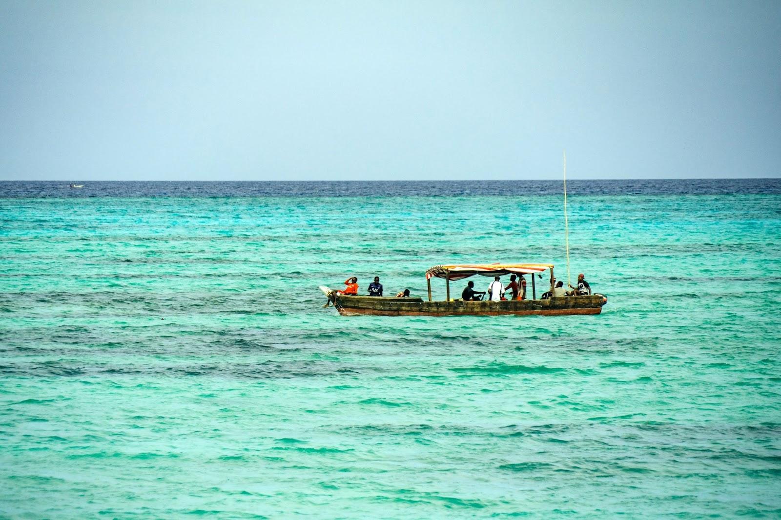 Tanzanian men fishing at Umluj Beach