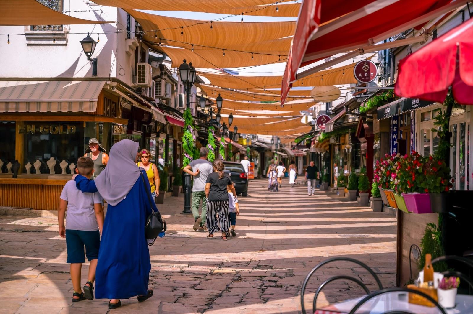 SKOPJE, NORTH MACEDONIA. Street of Old Bazaar market with pedestrians.