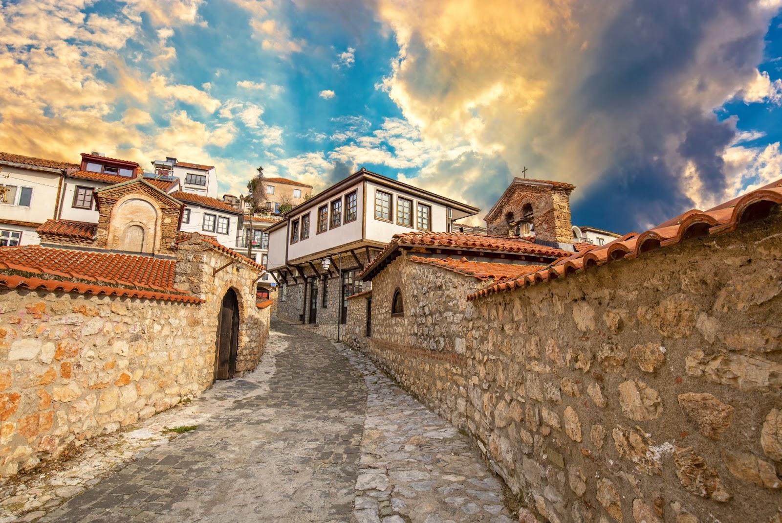 Narrow street in the old town of Ohrid on a beautiful sunset, North Macedonia