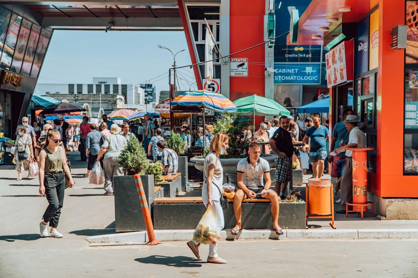 People and shops at Piata Centrala market Chisinau, Moldova