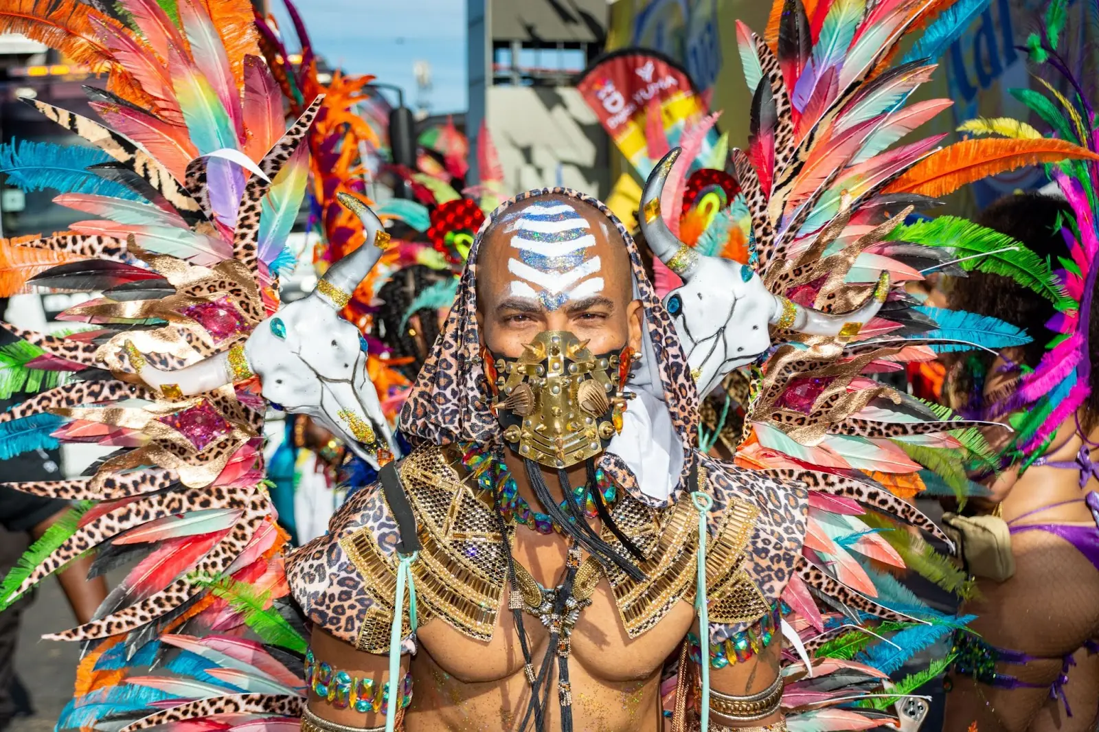 A male Masquerader enjoys himself in the Yuma Carnival in Port of Spain, Trinidad.