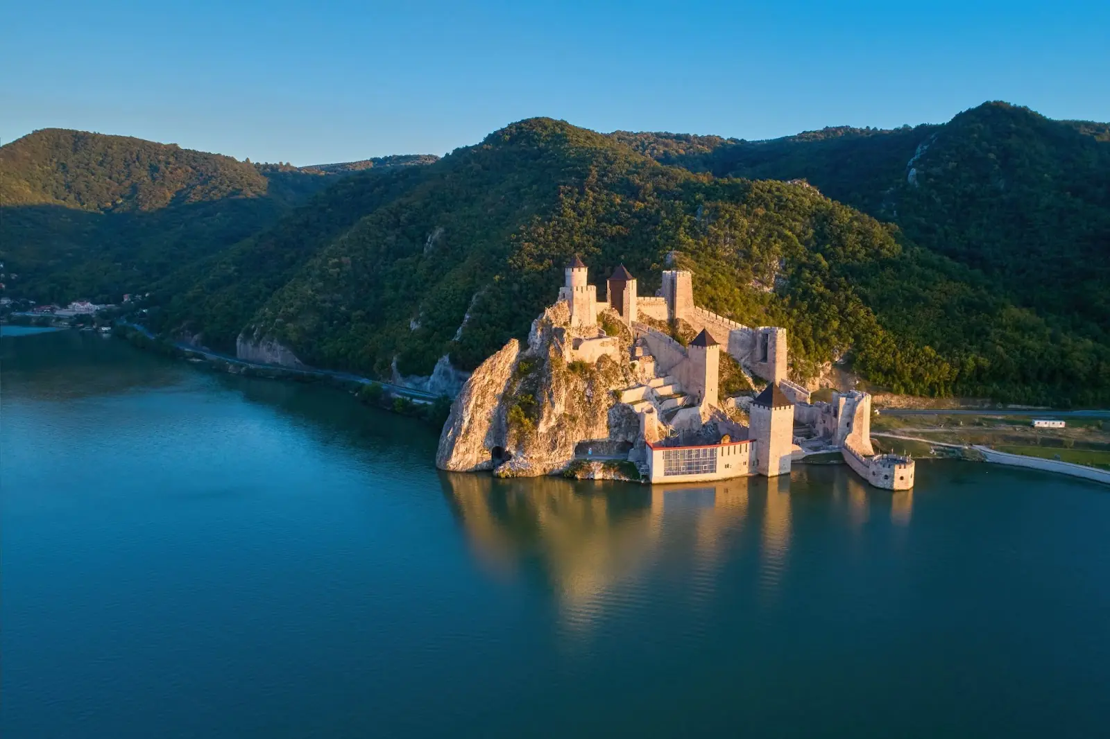 The medieval fortress of Golubac, mirroring in the waters of the Danube. 