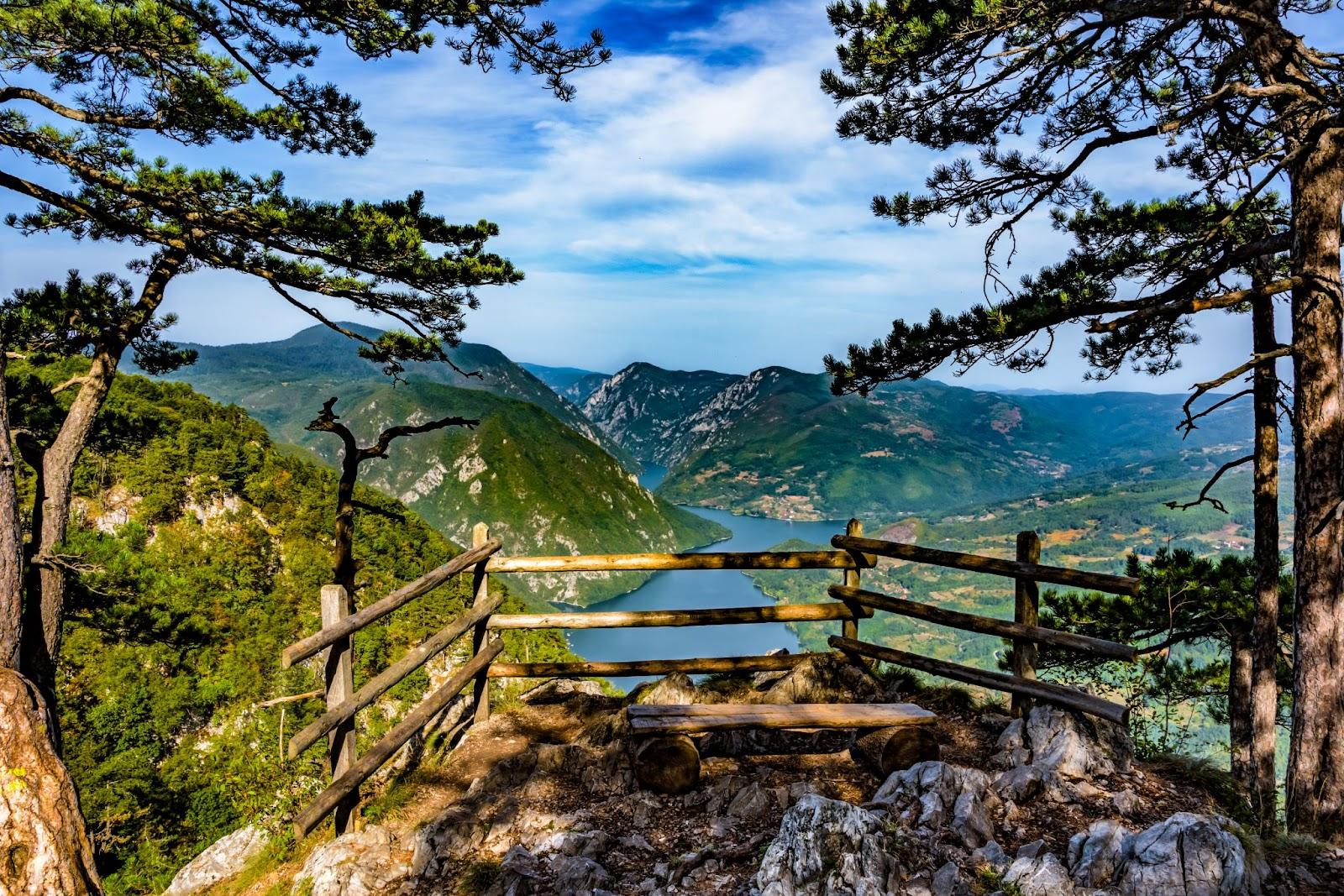 Banjska stena viewpoint in Tara National Park, Serbia. Beautiful landscape of the Drina river canyon and its green cliffs, and blue Perucac Lake.