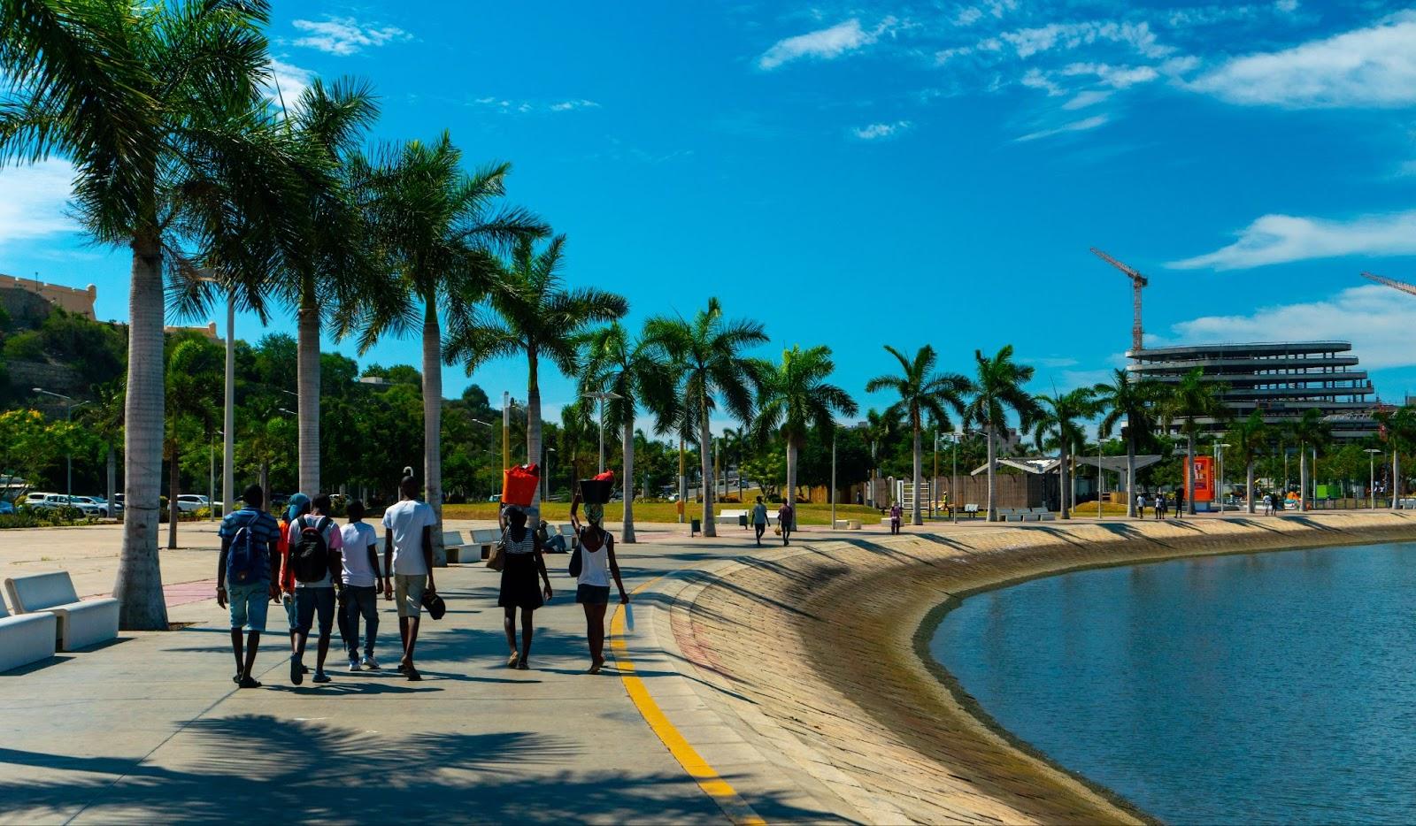 Luanda, Angola -  People walking  along the bay on a sunny day