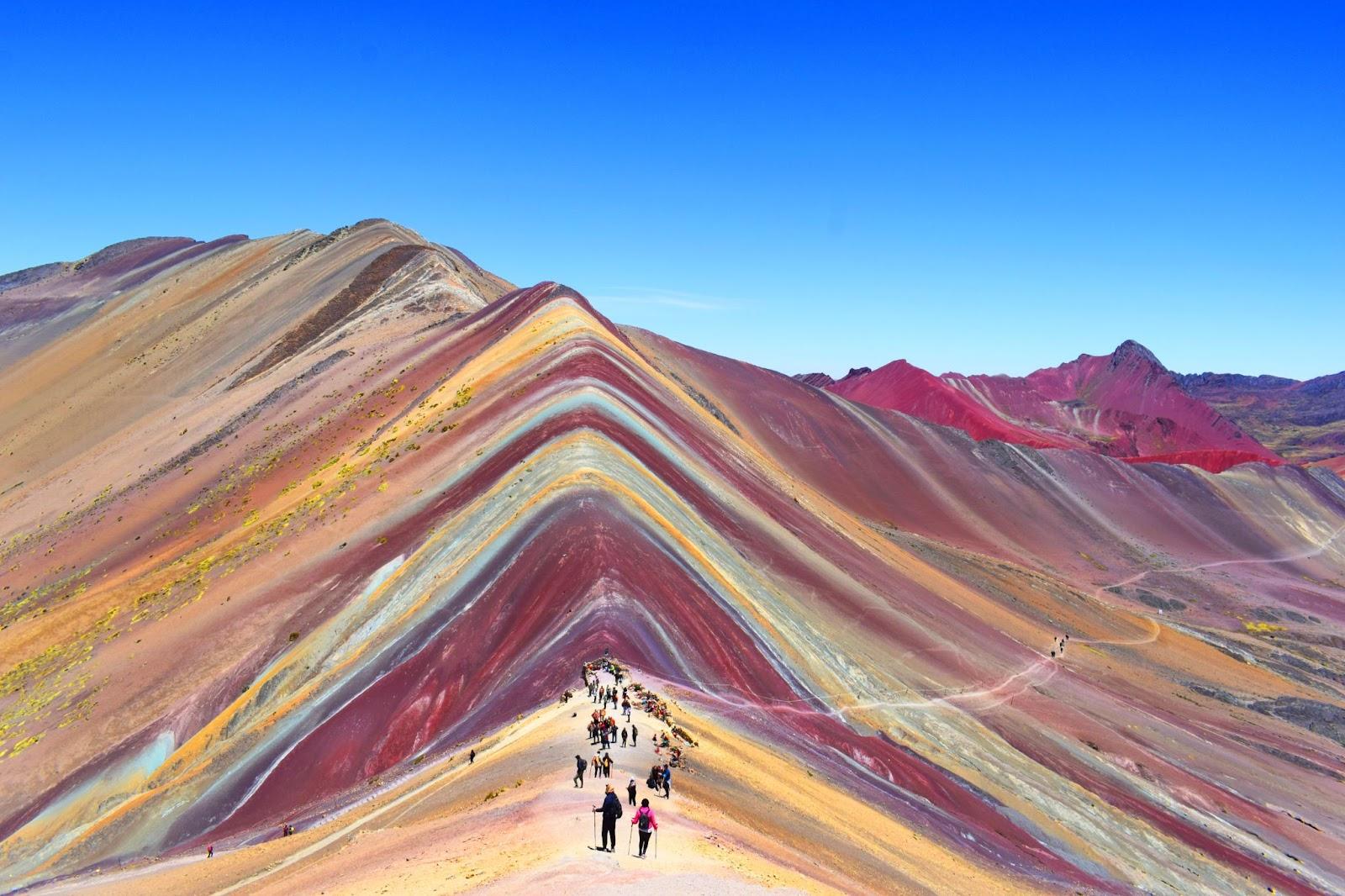 Rainbow mountain is totally clear with the sky like mirror CUSCO PERU