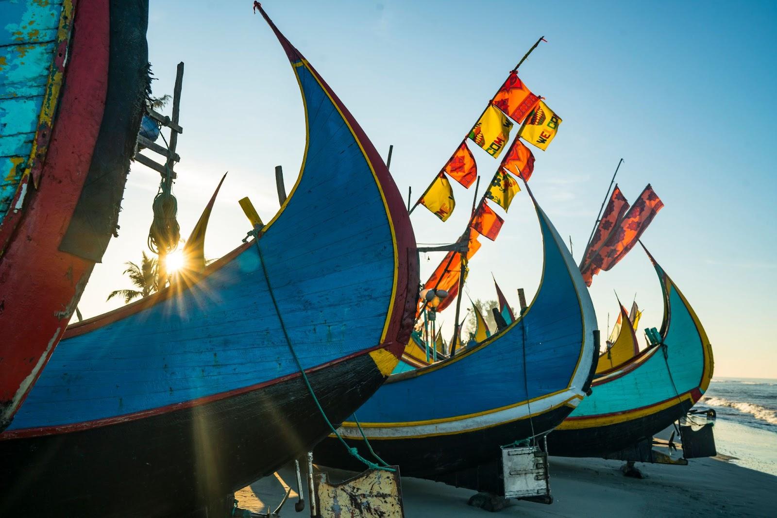 Colourful boats on the beach in box city of bangladesh cox