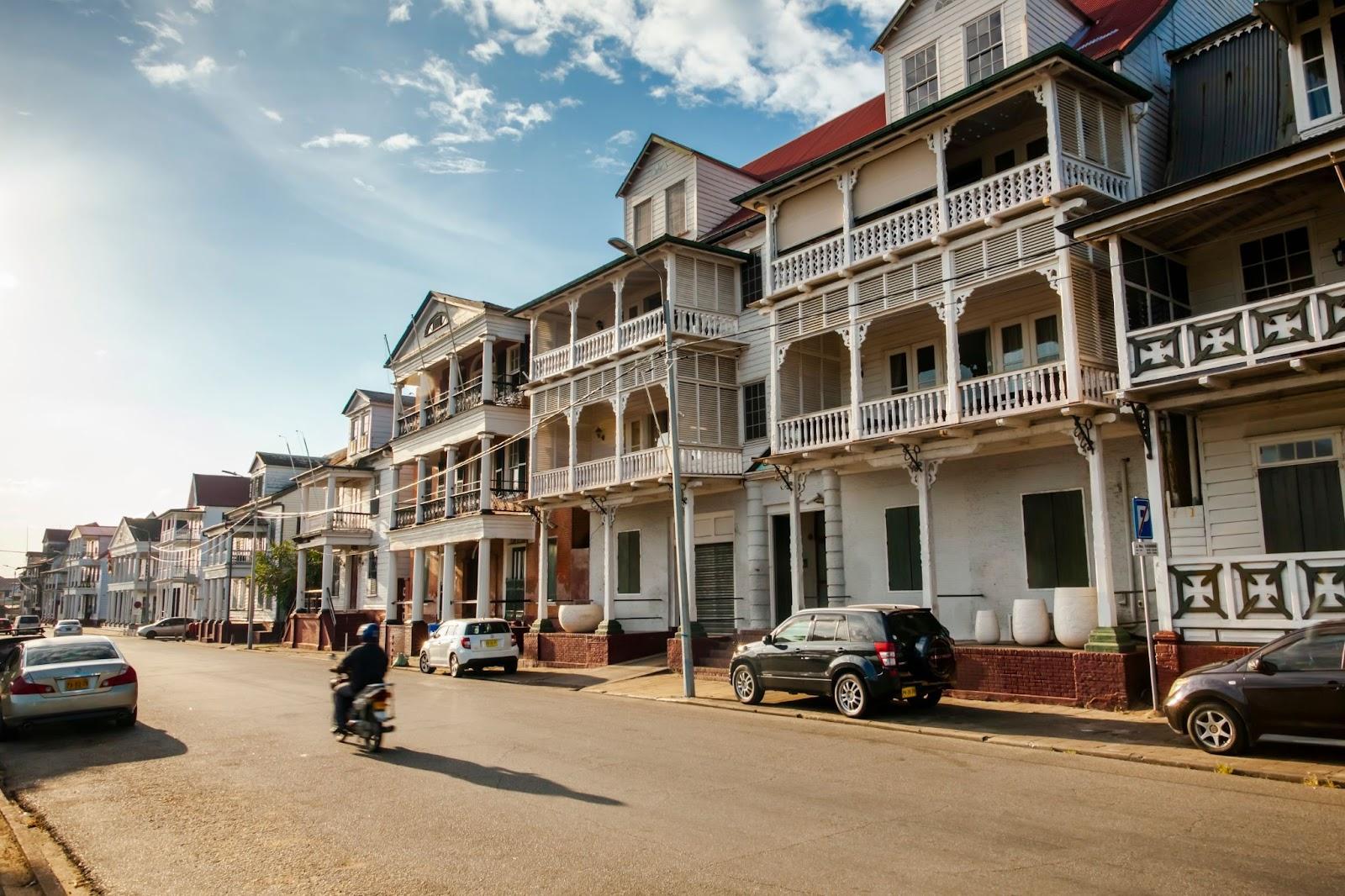 PARAMARIBO, SURINAME. Old colonial buildings on Waterkant or Waterside street in the evening sun