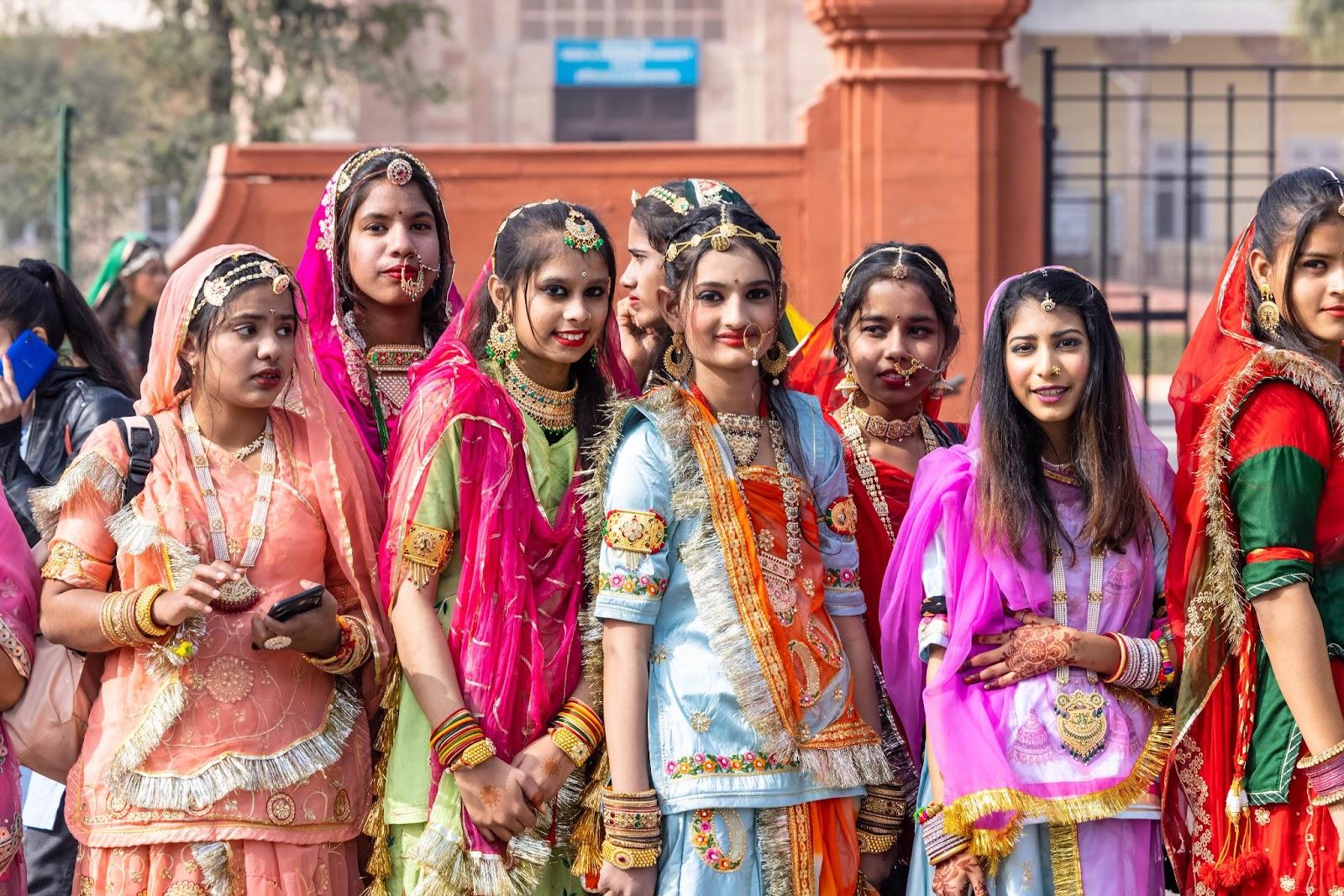 Camel Festival Bikaner, Group of young beautiful girls in traditional dress and jewellery of rajasthan while participating in the parade
