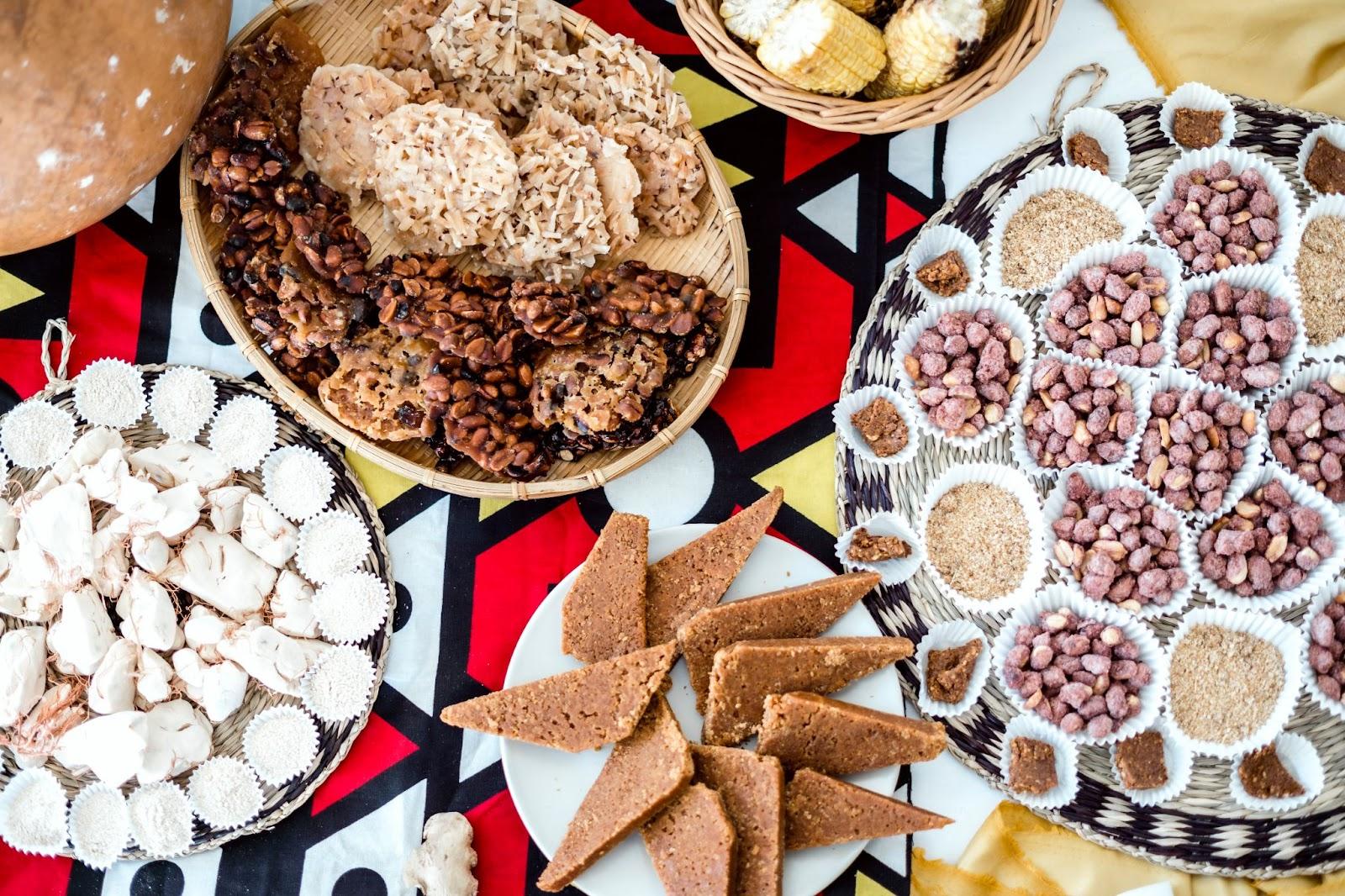 Variety of delicious dessert from Angola on a table covered with African fabric