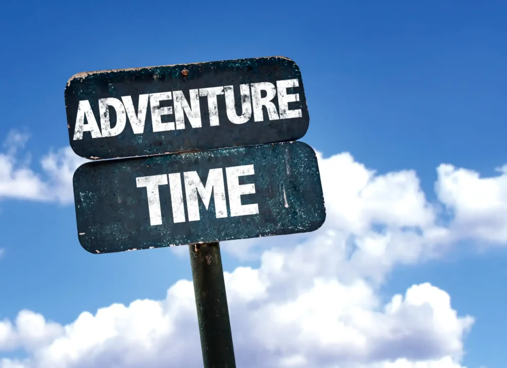 Adventure Time sign with sky background.
