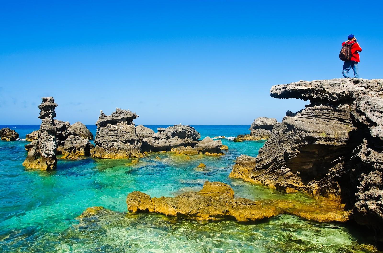 tobacco bay and hiker in st. george's bermuda