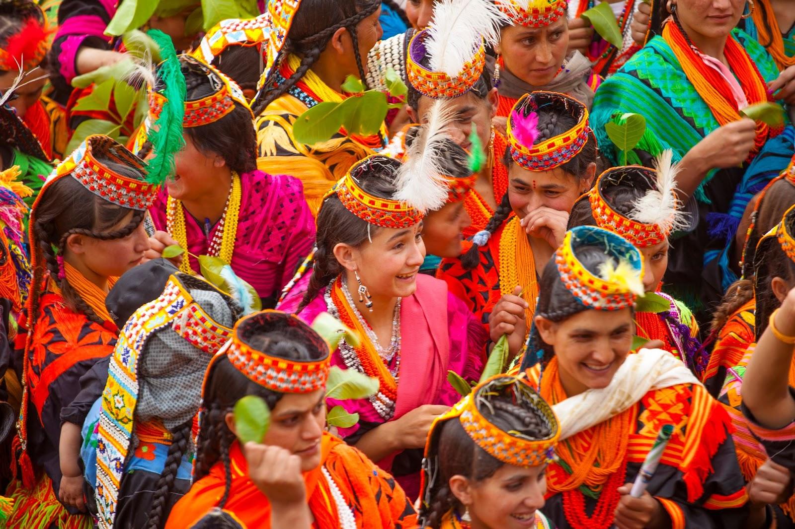 people of kalash valley Pakistan in traditional costumes during chilam josh festival