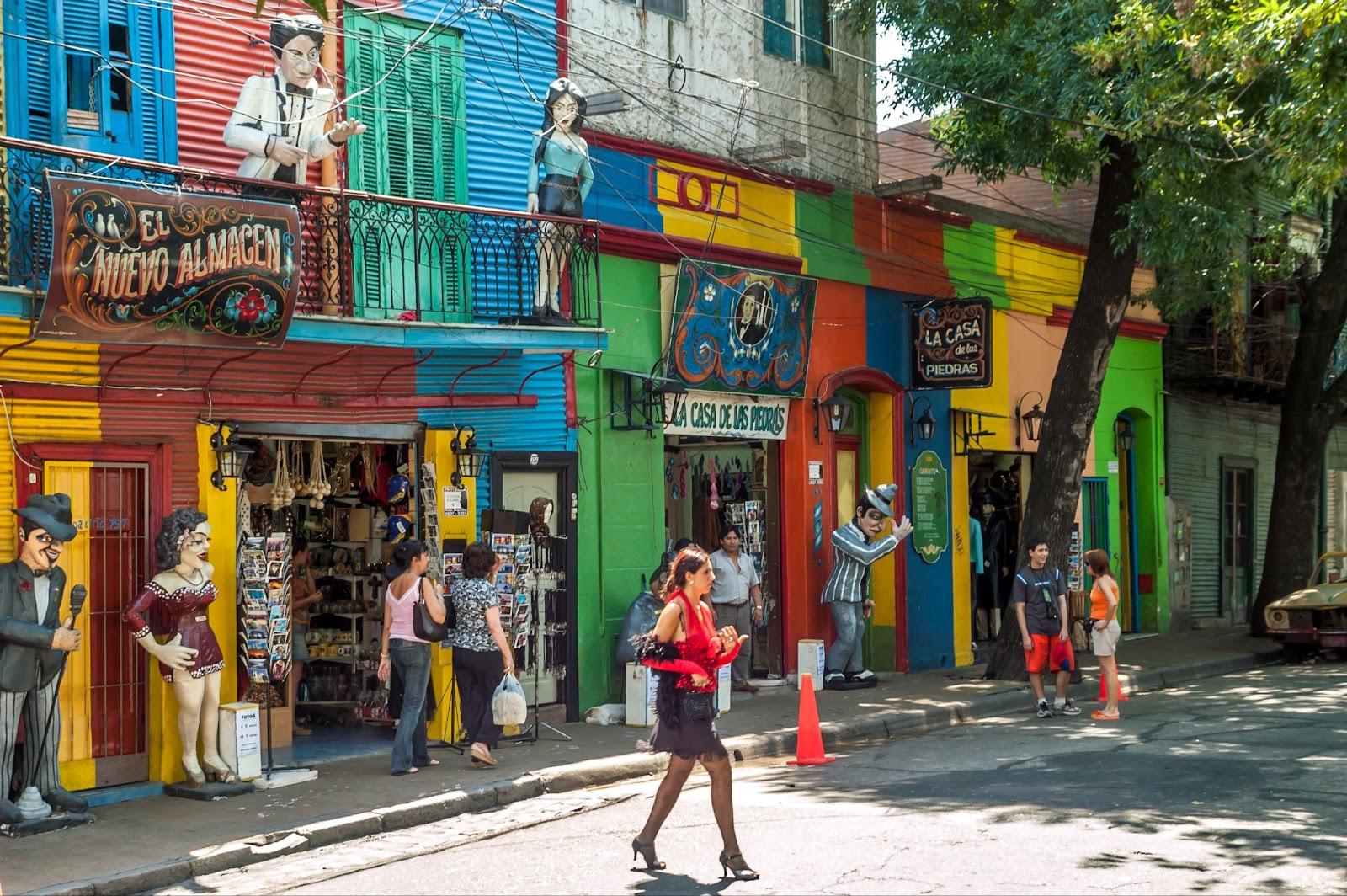 In the streets of La Boca in Buenos Aires is a number of colorful houses and tango teachers
