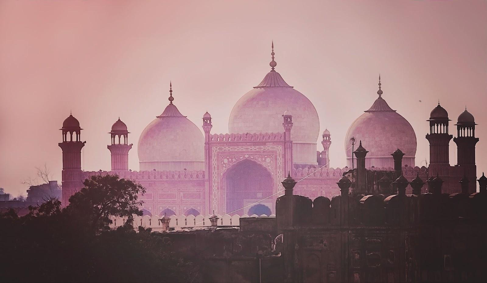 Domes of the The Badshahi Mosque (Emperor Mosque ) built in 1673 by the Mughal Emperor Aurangzeb in Lahore, Pakistan