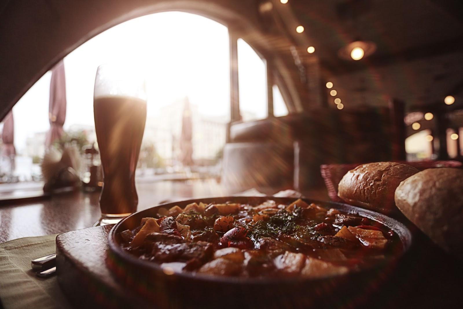 Traditional Czech food served hot in a pan in a restaurant