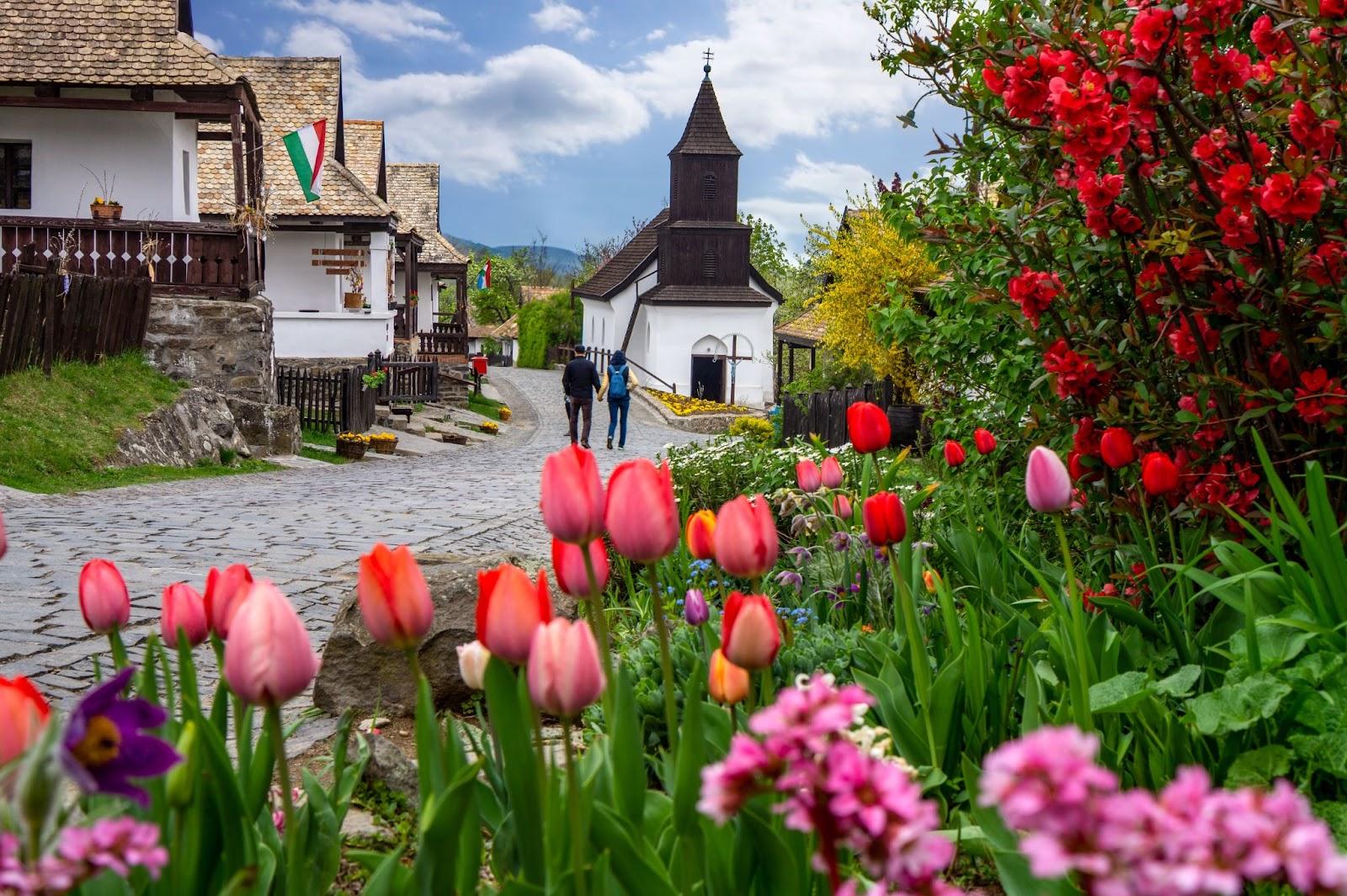 Little village Hollókő Holloko spring time in Hungary famous for easter celebration and its old traditional hungarian houses Unesco world heritage nyitva on the table means offen