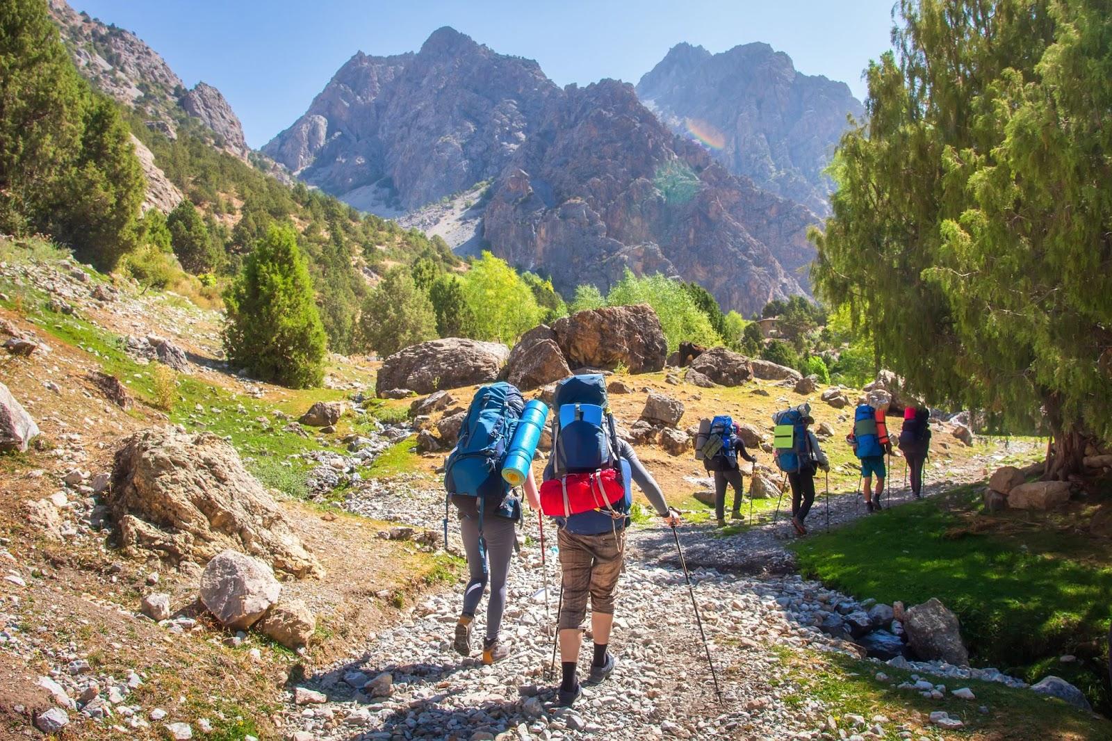 Tajikistan. Fann mountain trail. Tourists hiking.