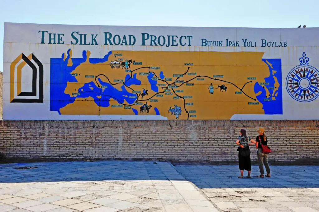Khiva, Uzbekistan. Tourists at the Silk Road map