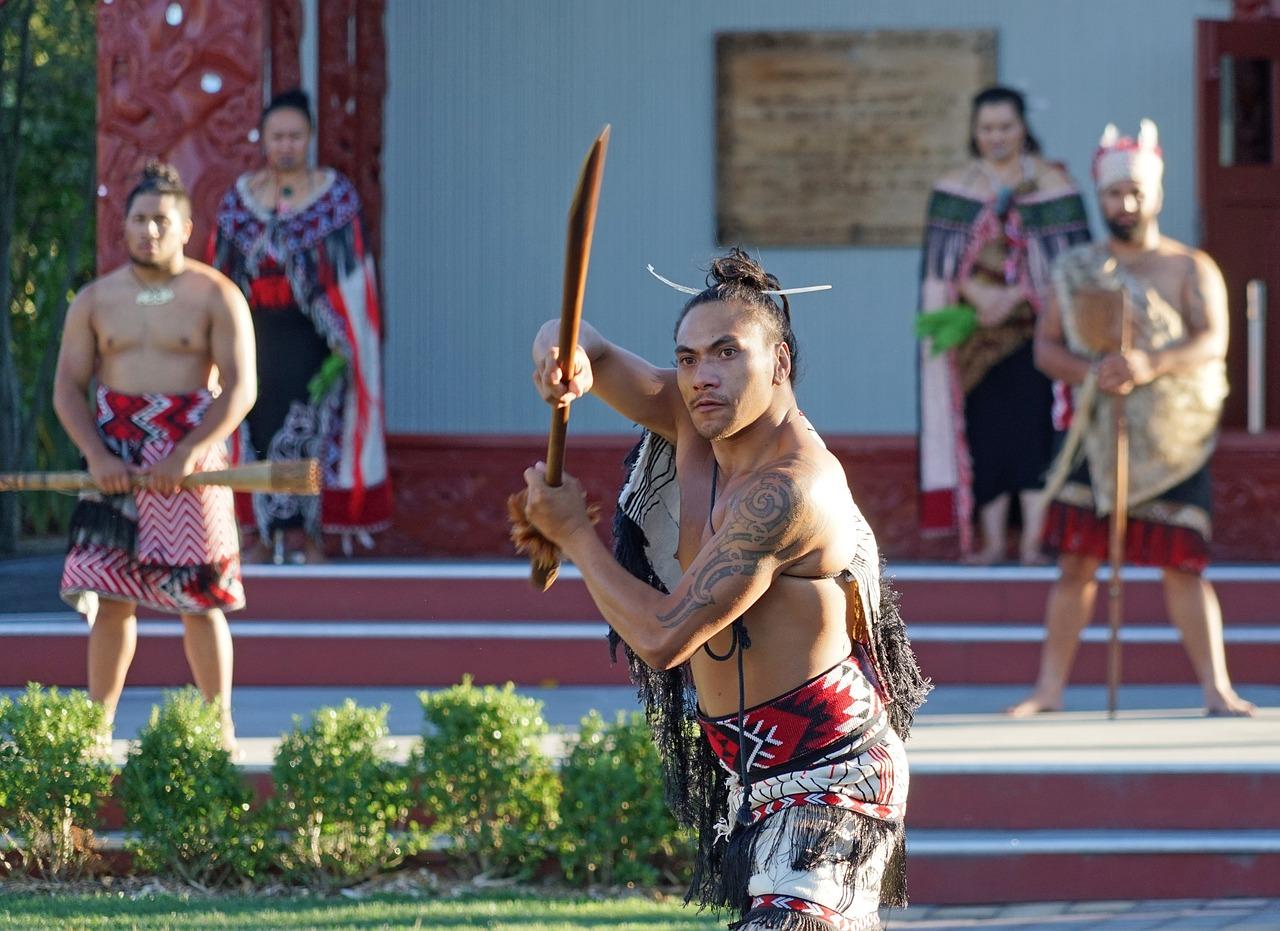 Maori painted warriors dancing