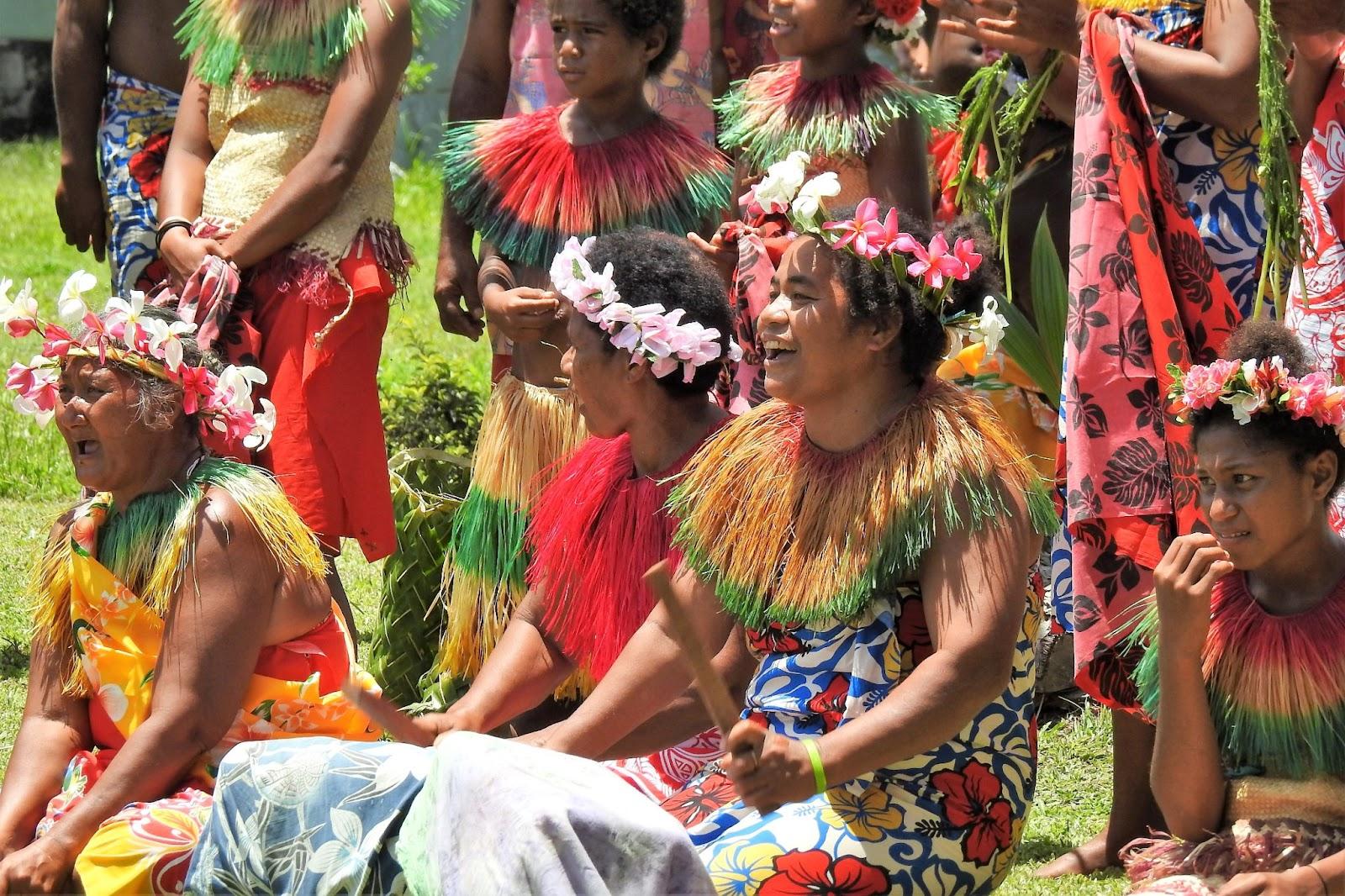 Colourfully Dressed Villagers Taking Part in a Cultural Performance for Visitors to Sikaiana Village near Honiara, Solomon Islands