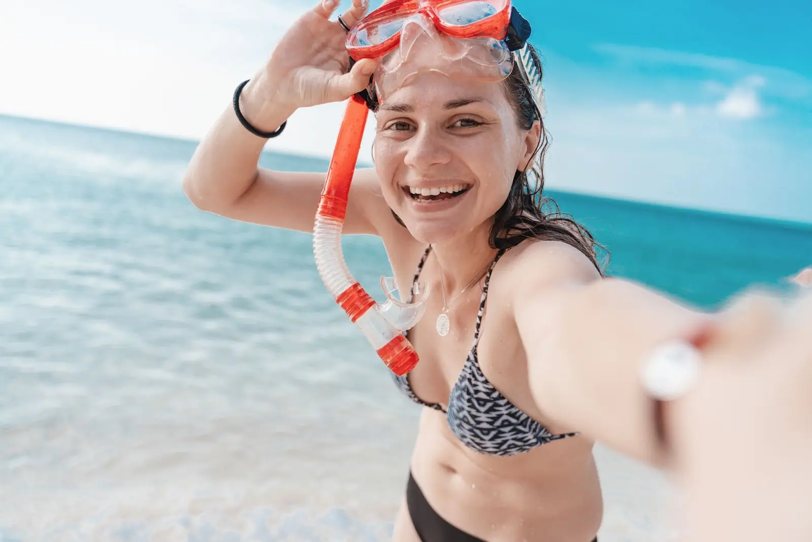 Happy tourist on the beach.