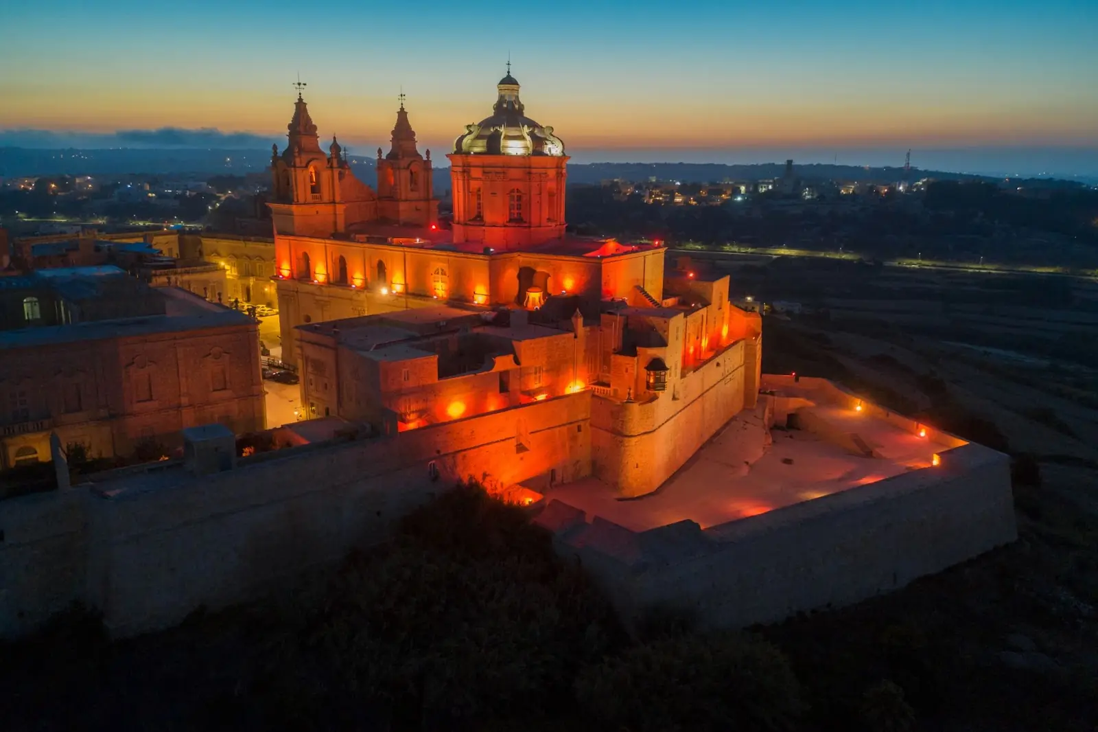 Mdina city - old capital of Malta. Night, evening. sunset, red street lamp and light