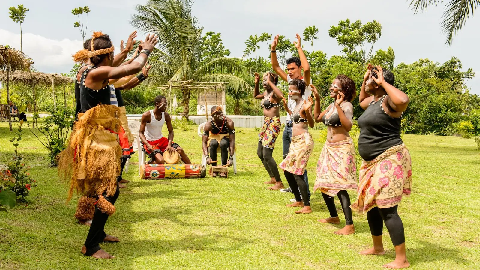 Gabonese people doing traditional dance
