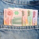 Central CFA francs in jeans pocket