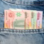 Central CFA francs in jeans pocket