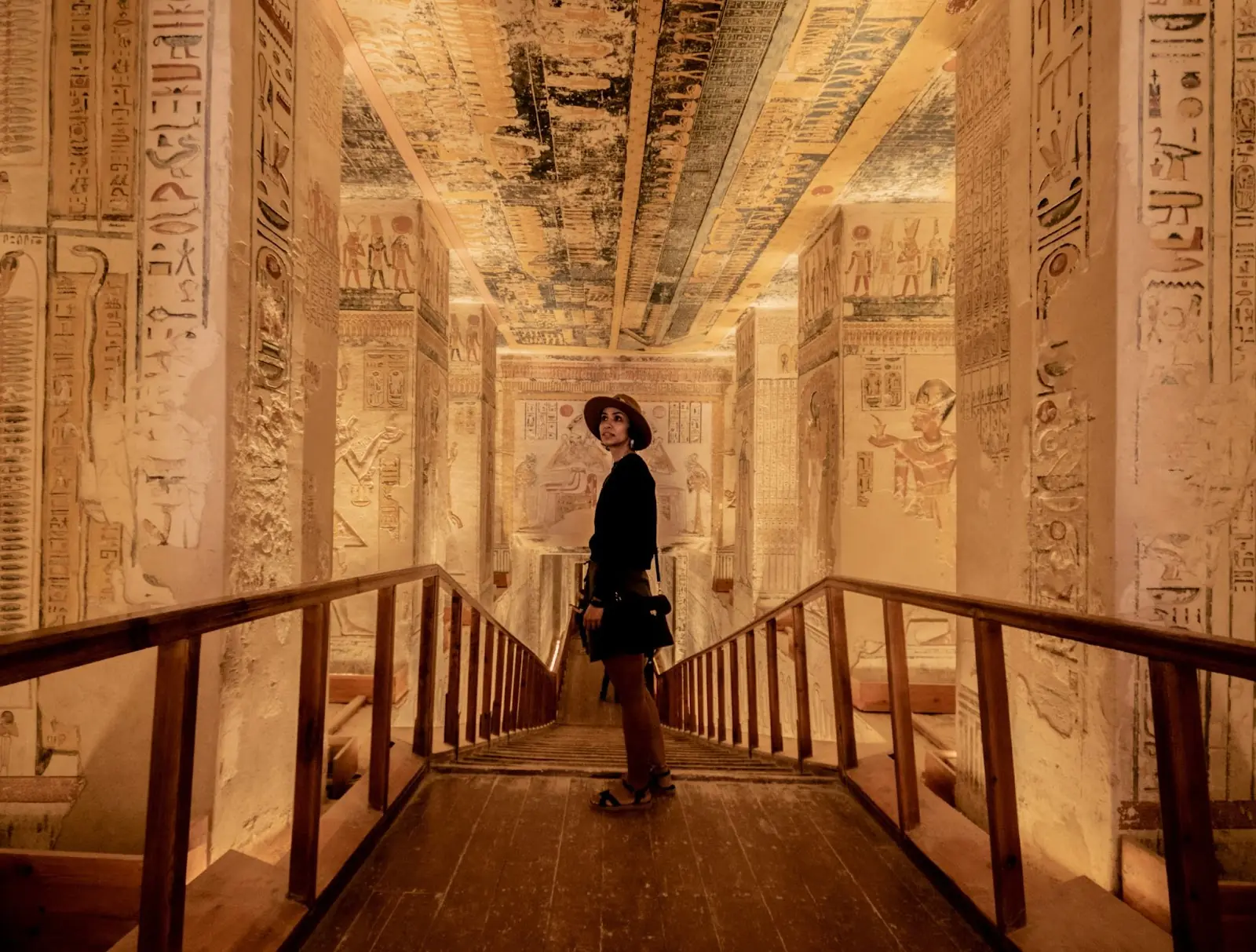 Woman stood inside one of the tombs of the pharos 