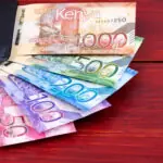 Kenyan shillings in a black wallet