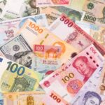 Many banknotes from different countries of the world of different denominations