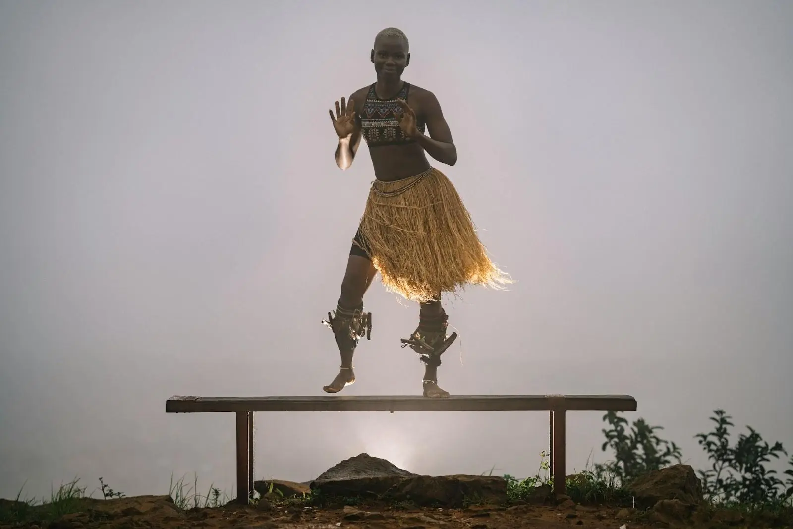 Young African dancer performing traditional dance. Freetown, Sierra Leone